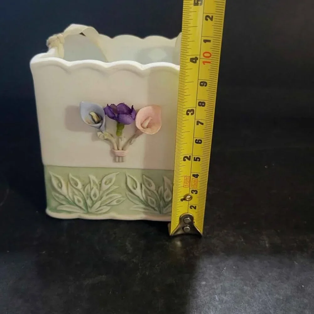 Vintage Porcelain Basket With Floral Embellishments And Decorative Ribbon